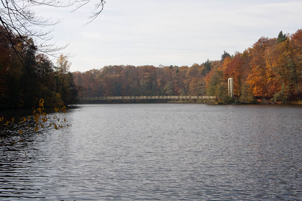 Wałcz - Lake Raduń in autumn, suspended bridge over the lake